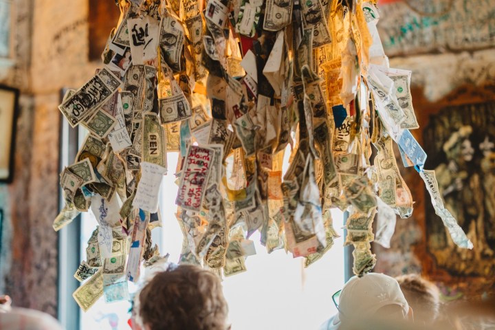a person standing in front of a store