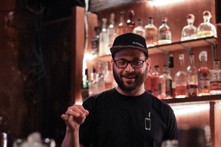 a man holding a glass of wine